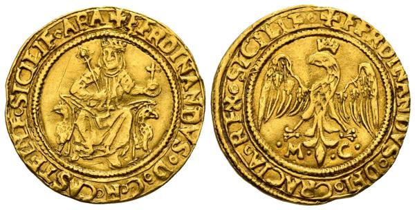 836 - FERNANDO EL CATÓLICO (1479-1516). Trionfo o Águila. (Au. 3,48g/22mm). S/D. Messina, Sicilia. (MIR 237.5. var). Cola del águila en forma de lis. MBC+. Muy rara.<BR><BR>Uno de los elementos iconográficos más destacados de estas monedas se encuentra en el reverso donde se puede ver el águila coronada siciliana de origen suabo (Conrado III fue el primer rey de romanos de la casa Hohenstaufen) con las iniciales MC. Las siglas corresponden a Matteo Campagna, maestro de ceca, e incisore, de la ceca de Messina desde 1467 y hasta 1499, con una pequeña interrupción entre 1476 y 1477 cuando fue sustituido por Giovanni di Cardona.  - 2.000€